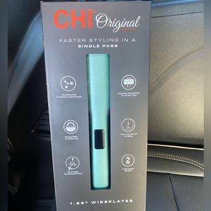 New, unopened in box CHI straightener